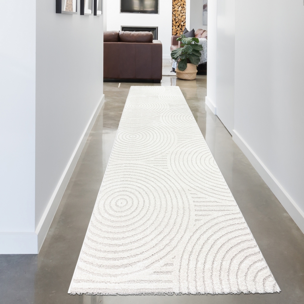 Moderner Wohnzimmerteppich mit elegantem Kreismuster in creme