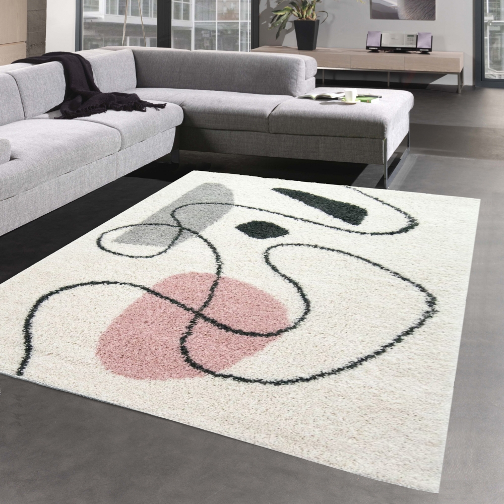 Designerteppich mit abstrakten Mustern in creme rosa