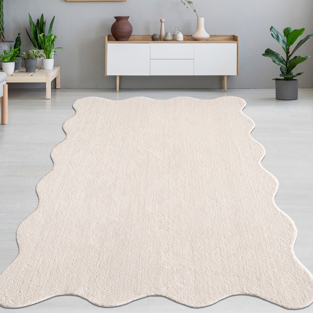 Design Teppich beige weich mit abstrakter Wellenform