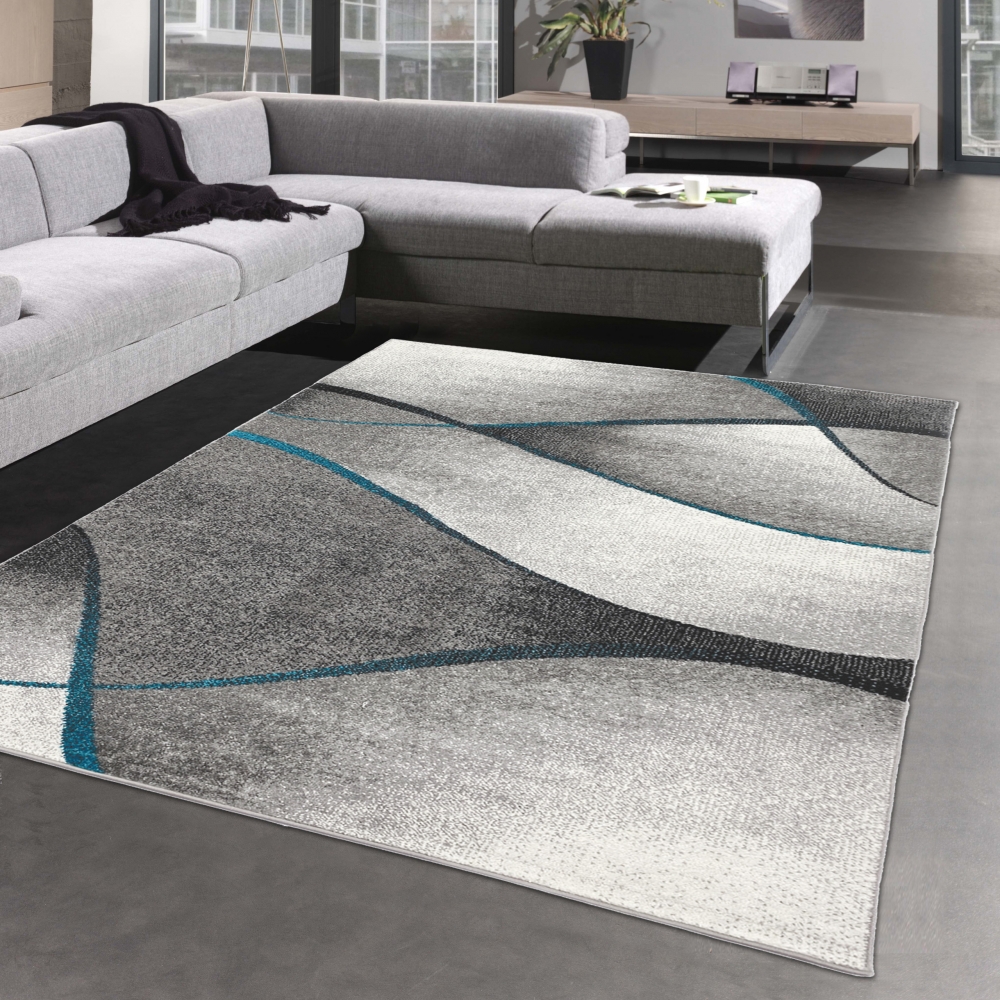 Teppich Wohnzimmer modernes Wellen Design in grau anthrazit blau - pflegeleicht