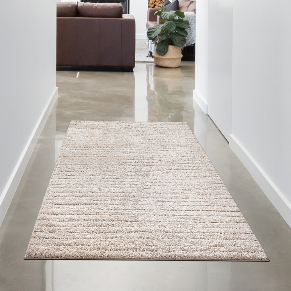 Moderner Teppich Beige Linienmuster weich robust für Wohnräume