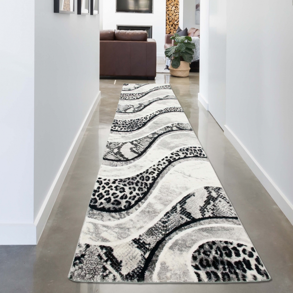 Designteppich Leopardenmuster Grau Schwarz Creme für moderne Räume