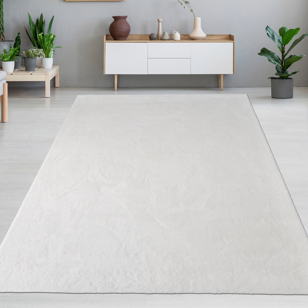 Teppich weiß Hasenfell-Optik elegant weich mit feinem Schimmer modern