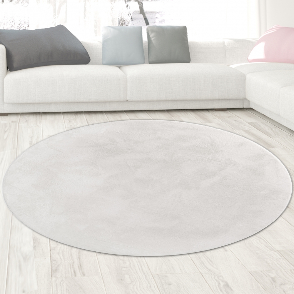 Teppich weiß Hasenfell-Optik elegant weich mit feinem Schimmer modern