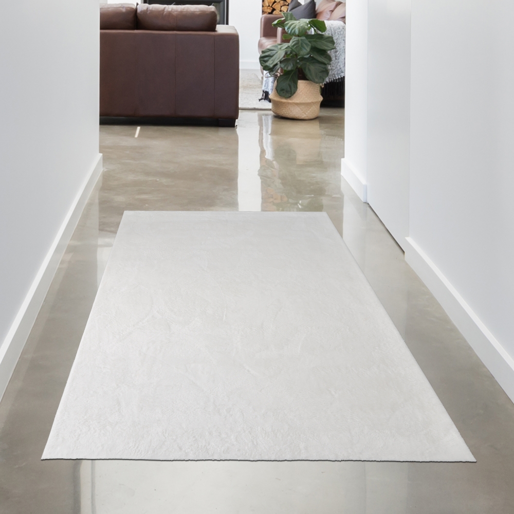 Teppich weiß Hasenfell-Optik elegant weich mit feinem Schimmer modern