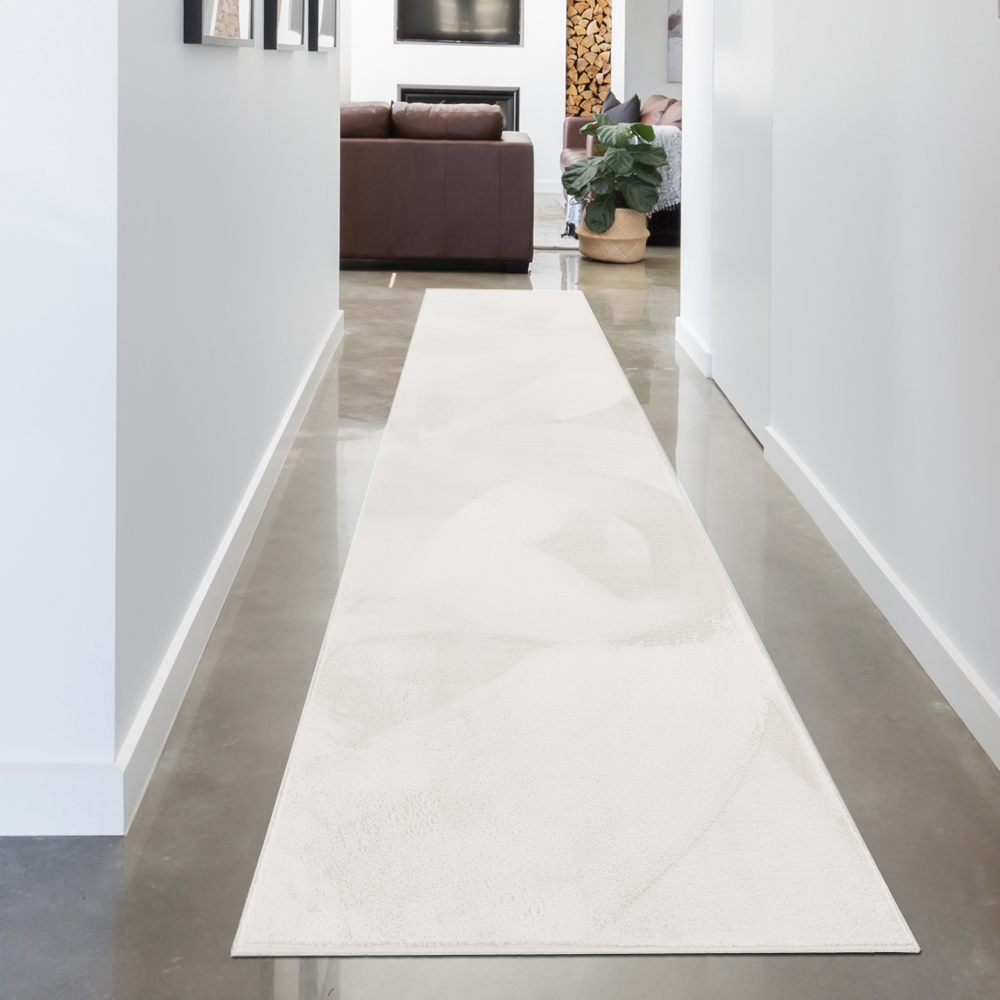 Teppich weiß Hasenfell-Optik elegant weich mit feinem Schimmer modern