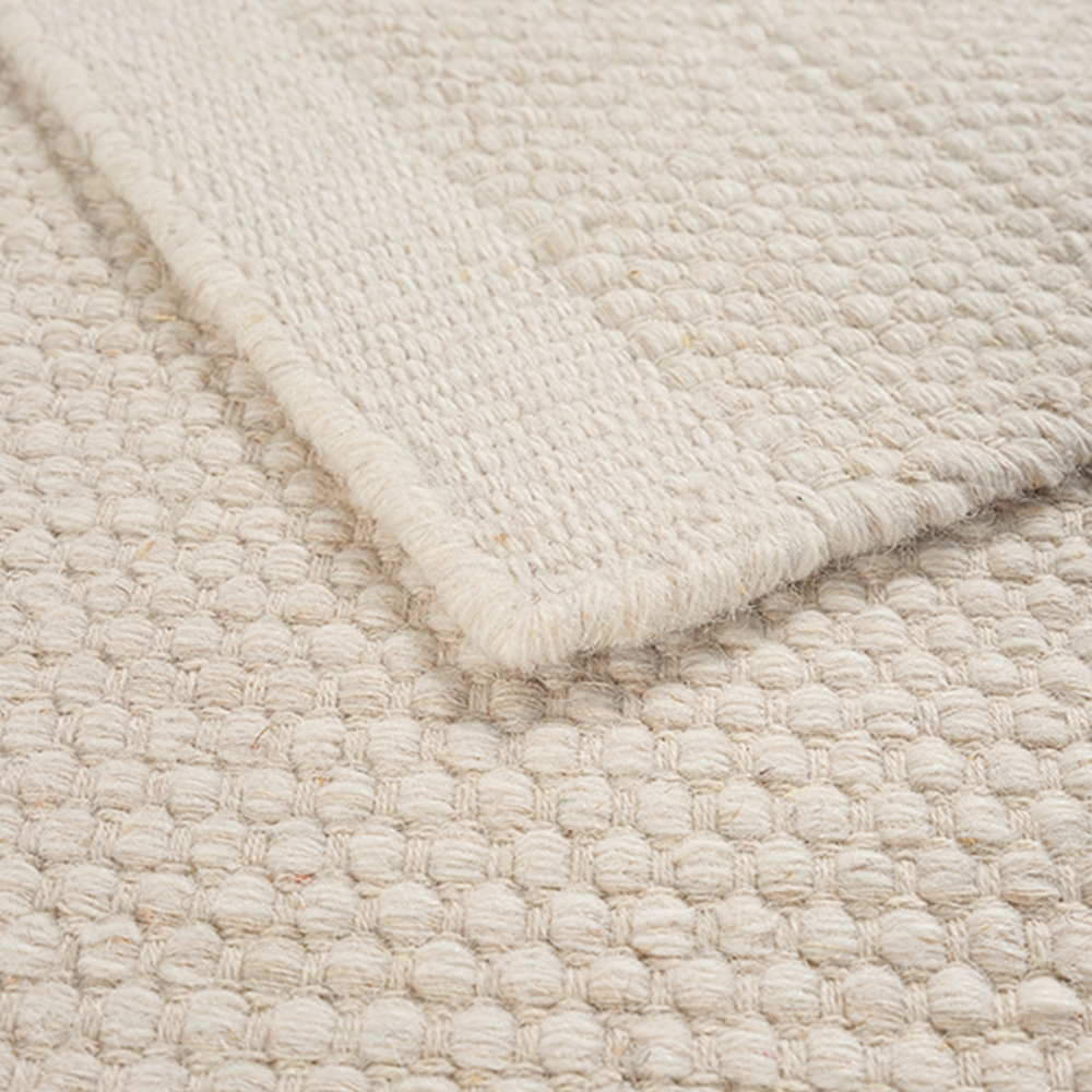 Handgewebter Wollteppich in edlem Creme für Wohnzimmer oder Schlafzimmer