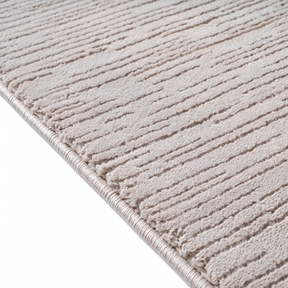 Stilvoller Teppich mit feiner Struktur und modernem Liniendesign in Beige