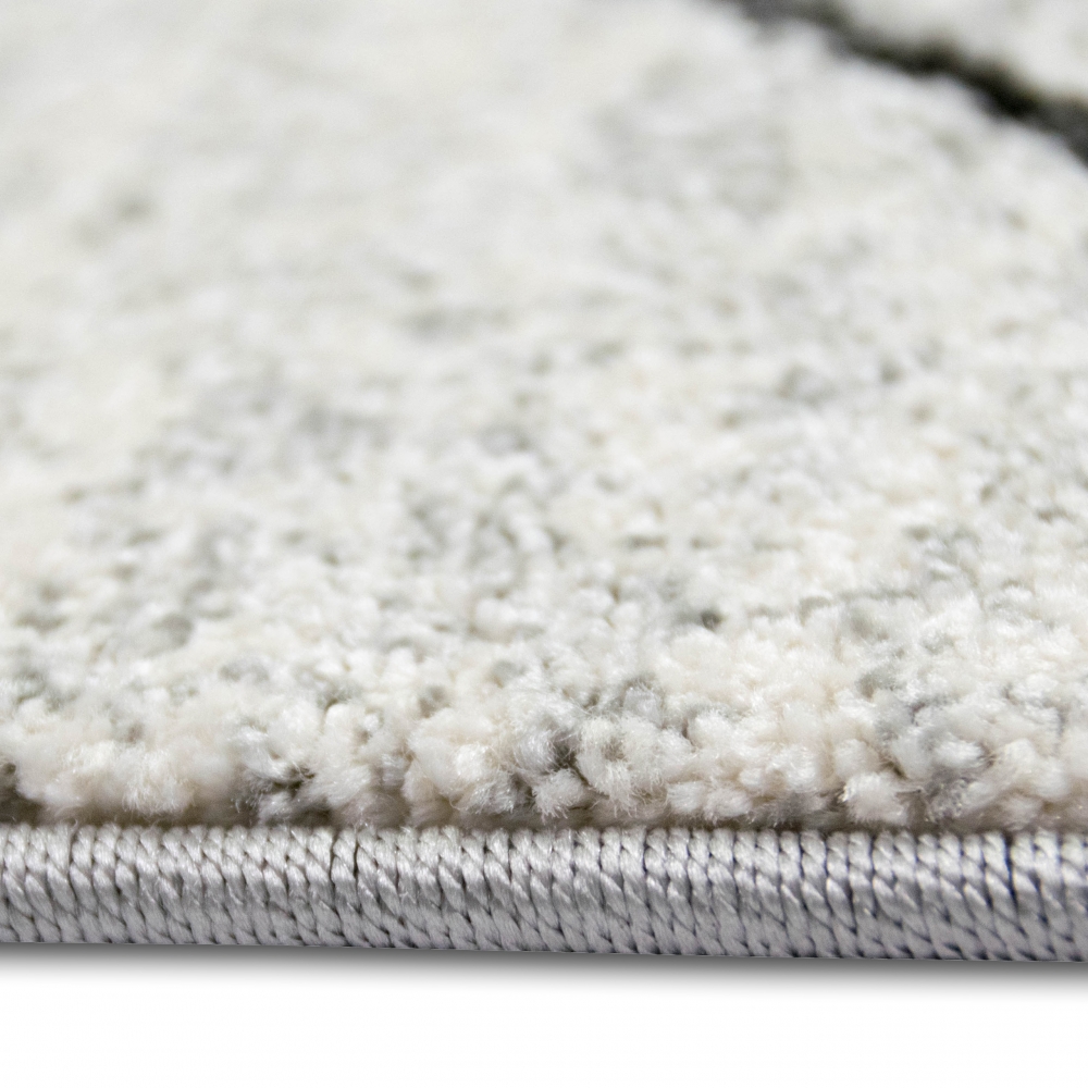 Design Teppich Creme Grau Rauten modern elegant Wohnbereich stilvoll