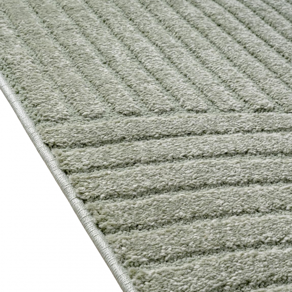 Designteppich grün mit Relieflinien modern pflegeleicht strukturiert