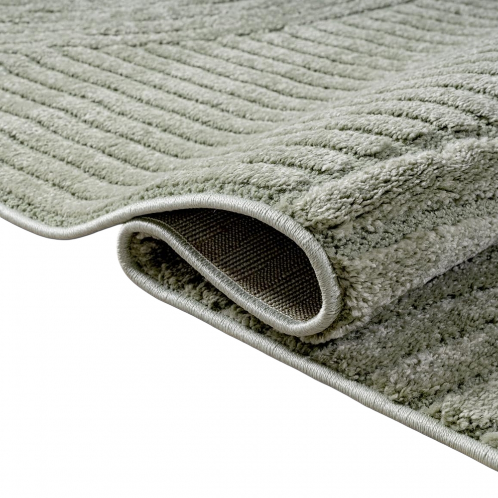 Designteppich grün mit Relieflinien modern pflegeleicht strukturiert