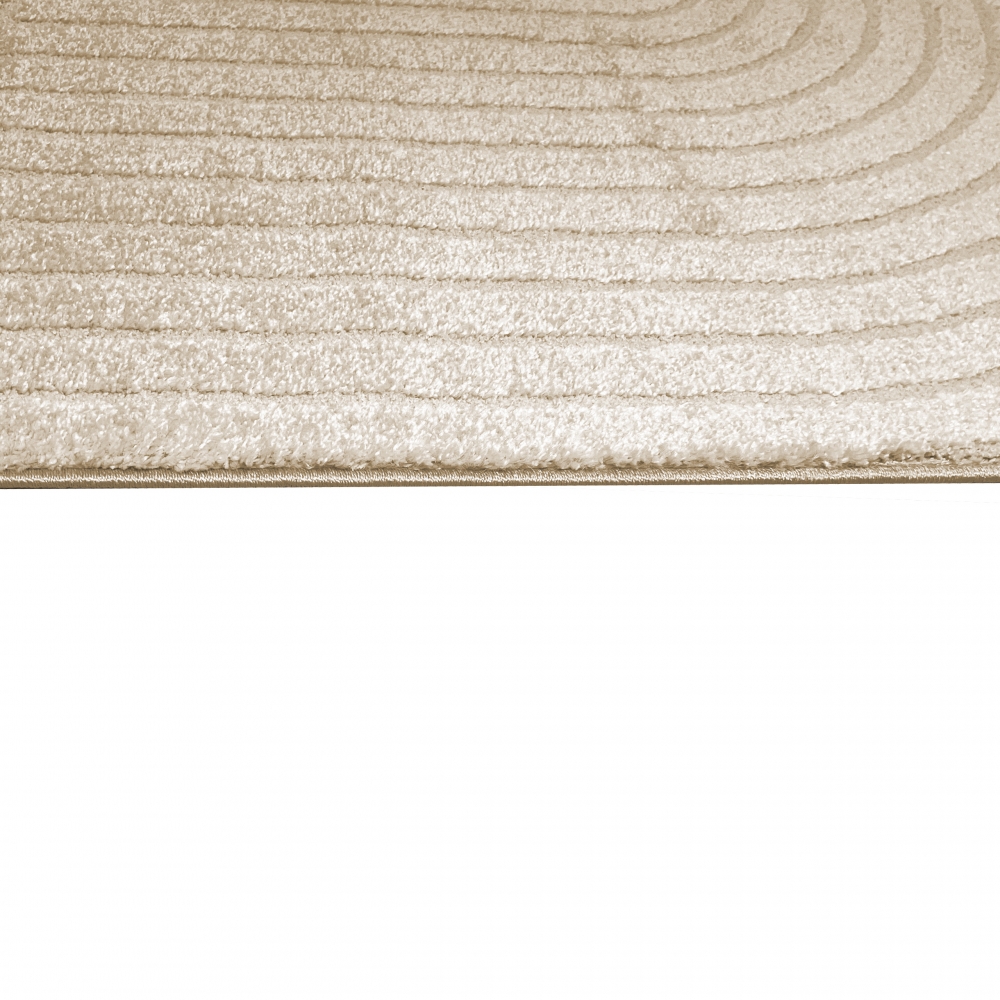 Moderner Teppich mit geschwungenem Muster in beige