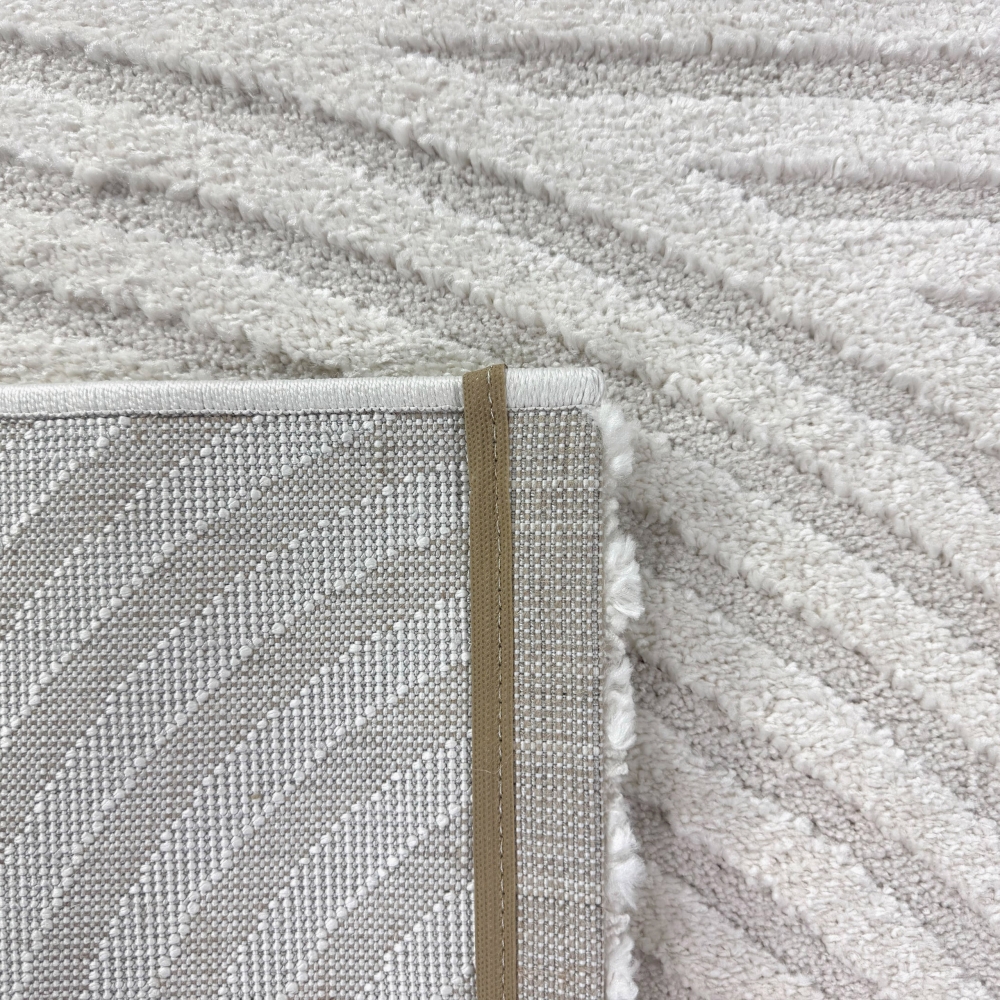 Moderner Wohnzimmerteppich mit elegantem Kreismuster in creme
