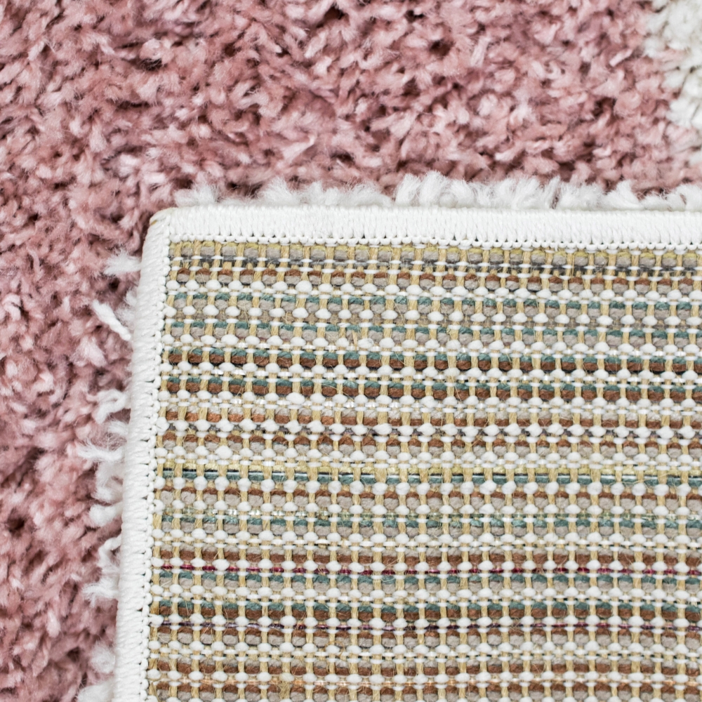 Designerteppich mit abstrakten Mustern in creme rosa