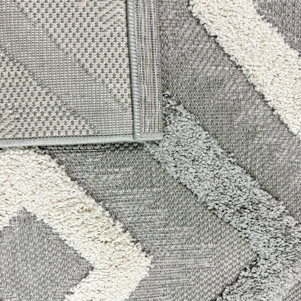 Moderner Teppich für Wohnzimmer und Flur in Grau und Beige mit Rautenmuster und Hoch-Tief-Effekt