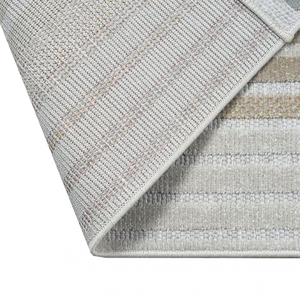 Vielseitiger In- & Outdoor Teppich in Creme mit Linienmuster in bunt