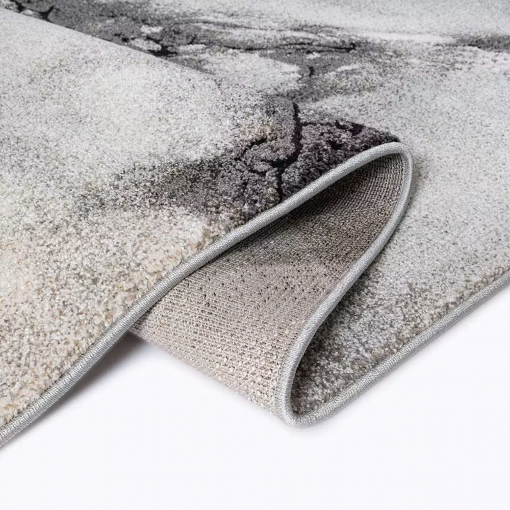 Design Teppich Grau Creme Steinstruktur modern elegant Wohnbereich