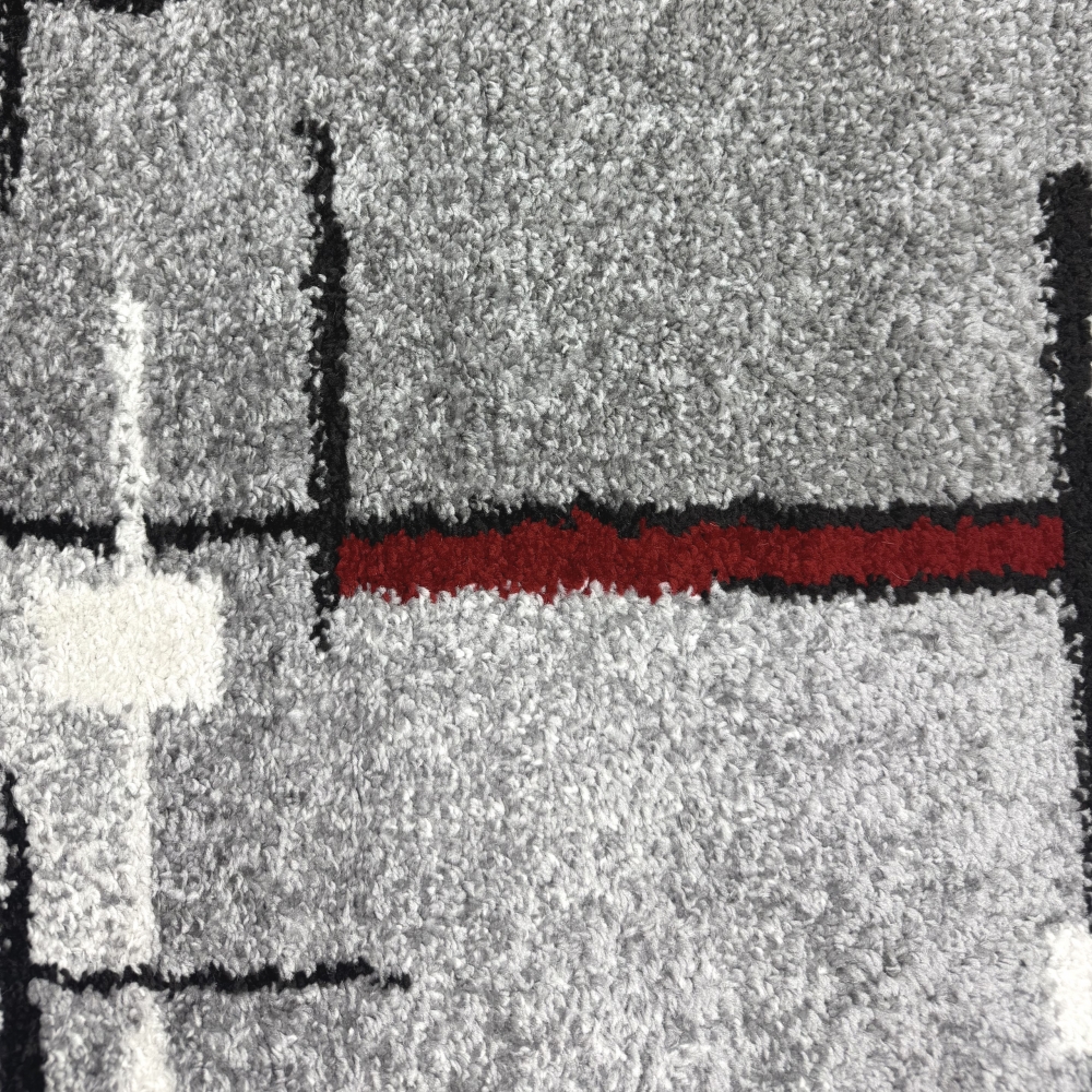 Designerteppich mit grafischem Muster – Grau, Rot & Weiß