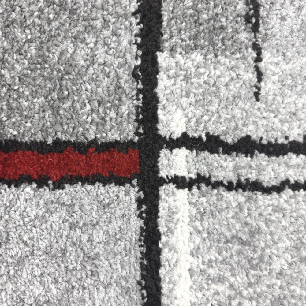 Designerteppich mit grafischem Muster – Grau, Rot & Weiß