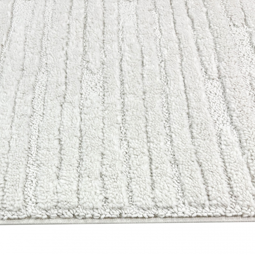 Teppich Wohnzimmer Schlafzimmer mit verschieden gemusterten Linien in creme grau