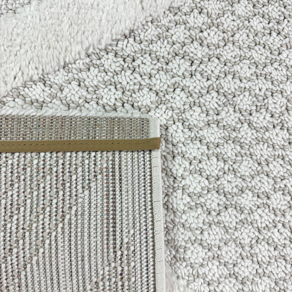 Wohnzimmer Schlafzimmer Teppich mit verschieden gemusterten Rauten in creme grau