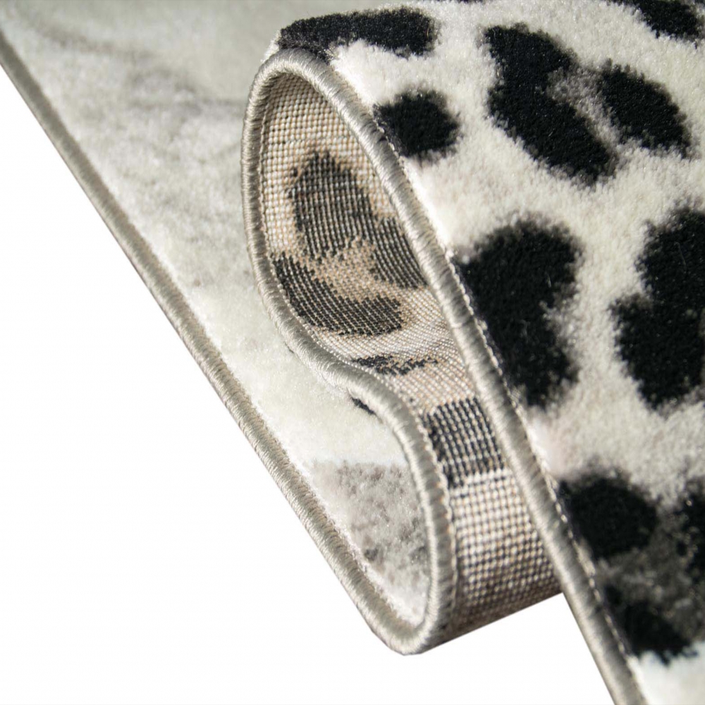 Designteppich Leopardenmuster Grau Schwarz Creme für moderne Räume