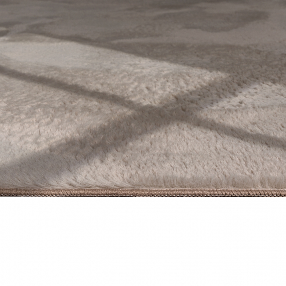 Teppich beige Hasenfell-Optik elegant weich mit feinem Schimmer modern